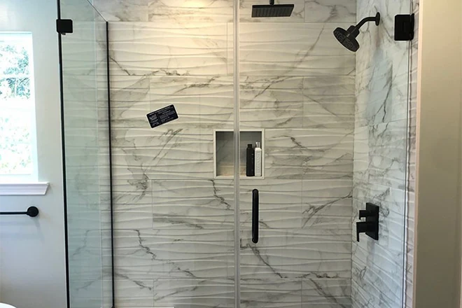Glass frame shower with built-in bench