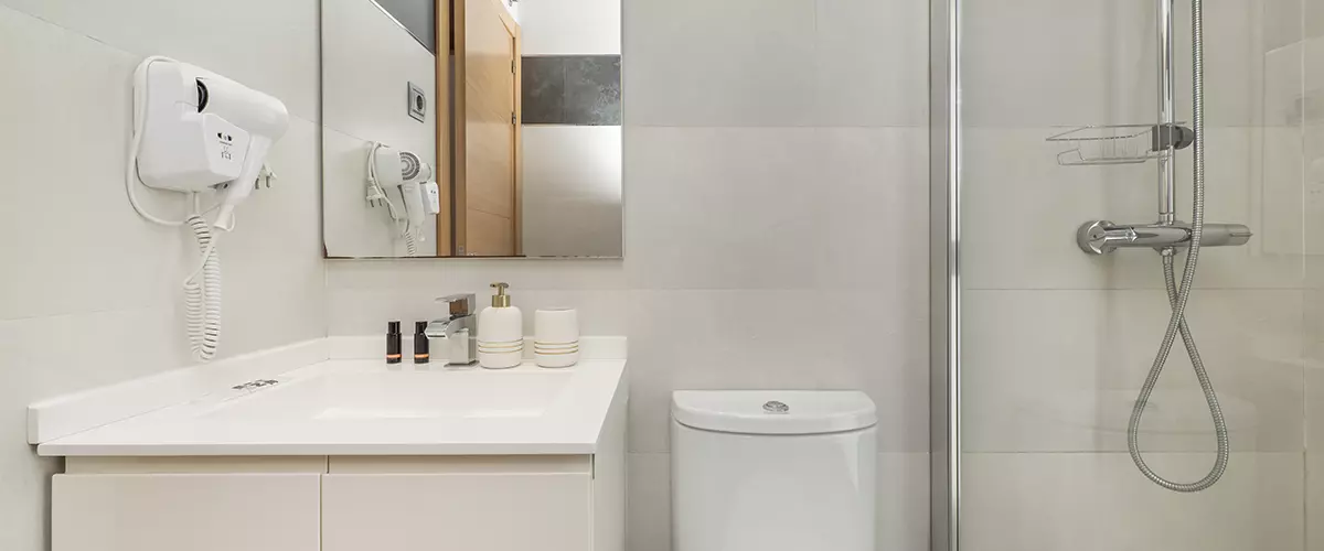 Clawfoot bathtub with chrome fixtures in a classic white bathroom.