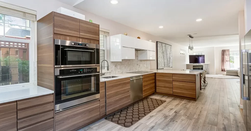 modern kitchen flooring with wood cabinets and large island