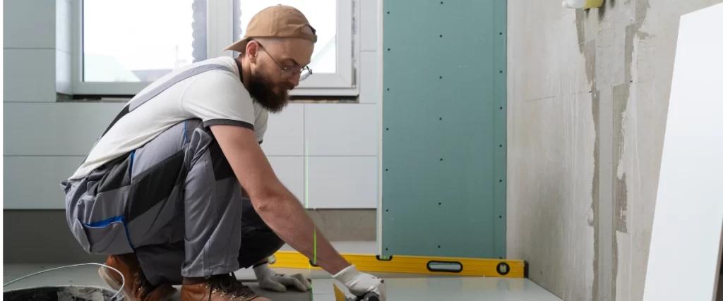 Tiler working on a bathroom renovation