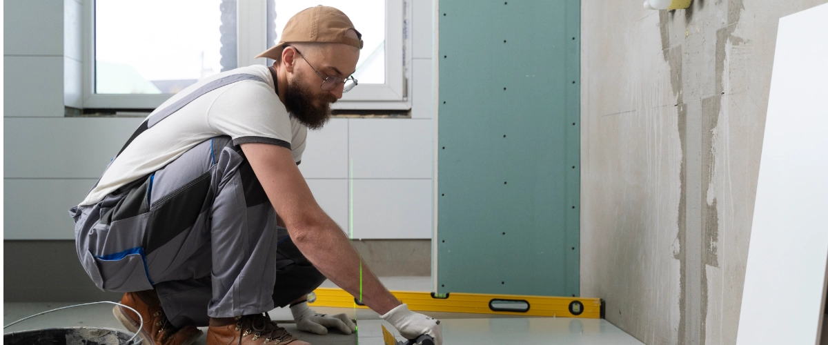 Tiler working on a bathroom renovation