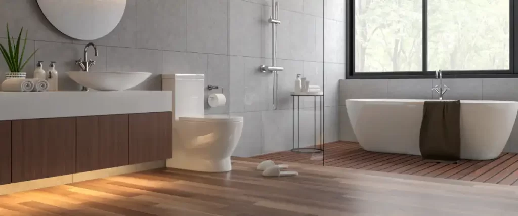 Clean bathroom with bathtub and wooden floor